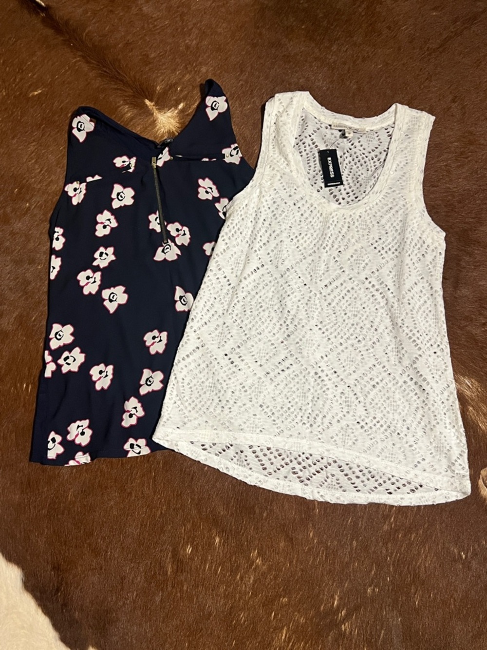 Navy Floral Zip-Front Tank Top and White Sleeveless Tank Top by Express